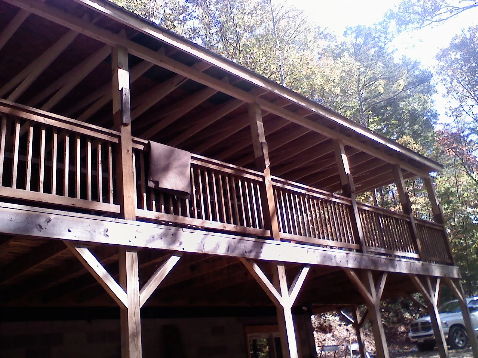 Timber framing under a new elevated porch and deck — Roof Leak Repair in Rock Tavern by Roofing Brothers